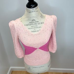 Beautiful handmade top adjourned with Swarovski crystals.